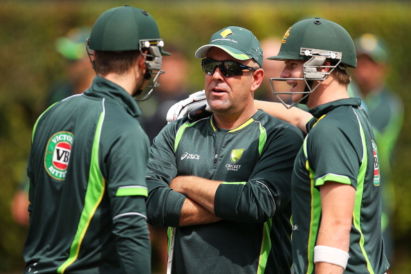 SYDNEY, AUSTRALIA - JANUARY 01:  Australian coach, Darren Lehmann shares a joke with his players Michael Clarke and Steven Smith during an Australian training session at Sydney Cricket Ground on January 1, 2014 in Sydney, Australia.  (Photo by Brendon Thorne/Getty Images)