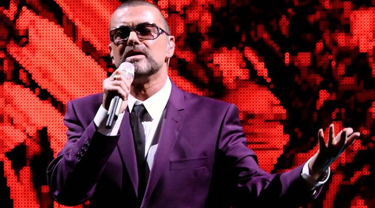 FILE PHOTO British singer George Michael performs on stage during his "Symphonica" tour concert in Vienna